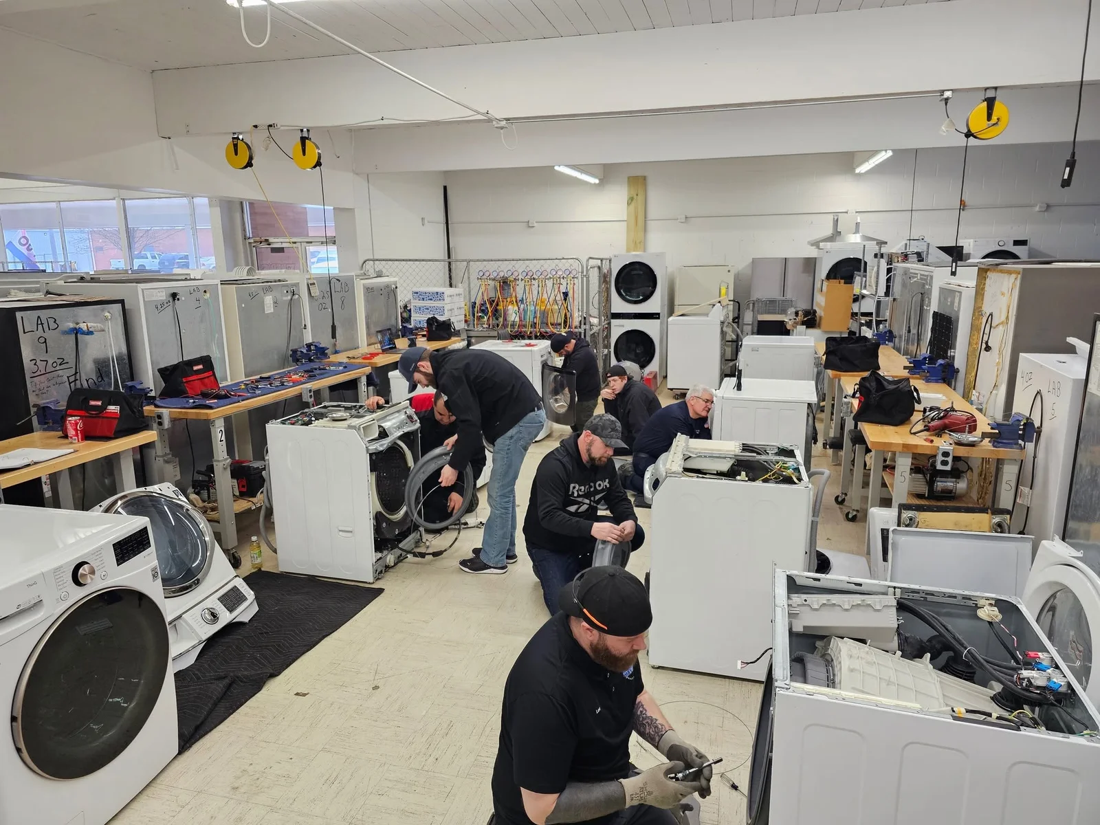 Precision Appliance Repair Dubai technician fixing a home appliance